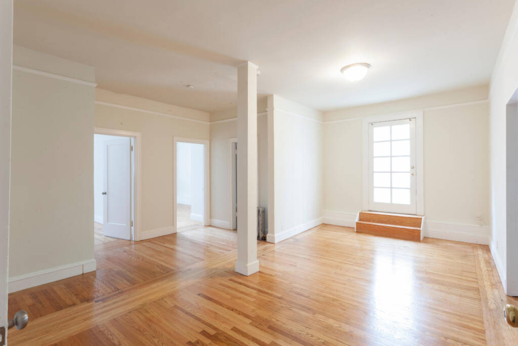 Empty room showcasing clean hardwood flooring